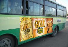 Quảng cáo trên xe buýt bia Gold